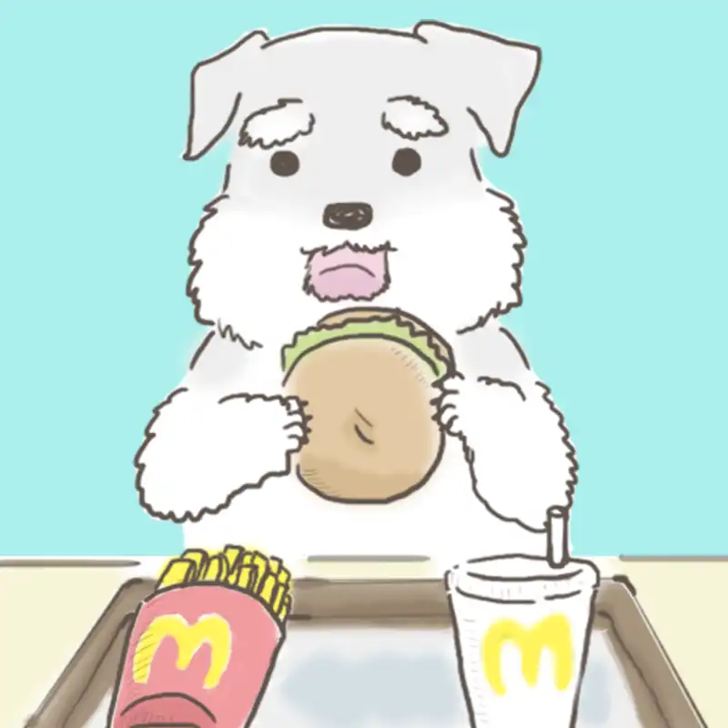 ハンバーガーを食べる髭犬